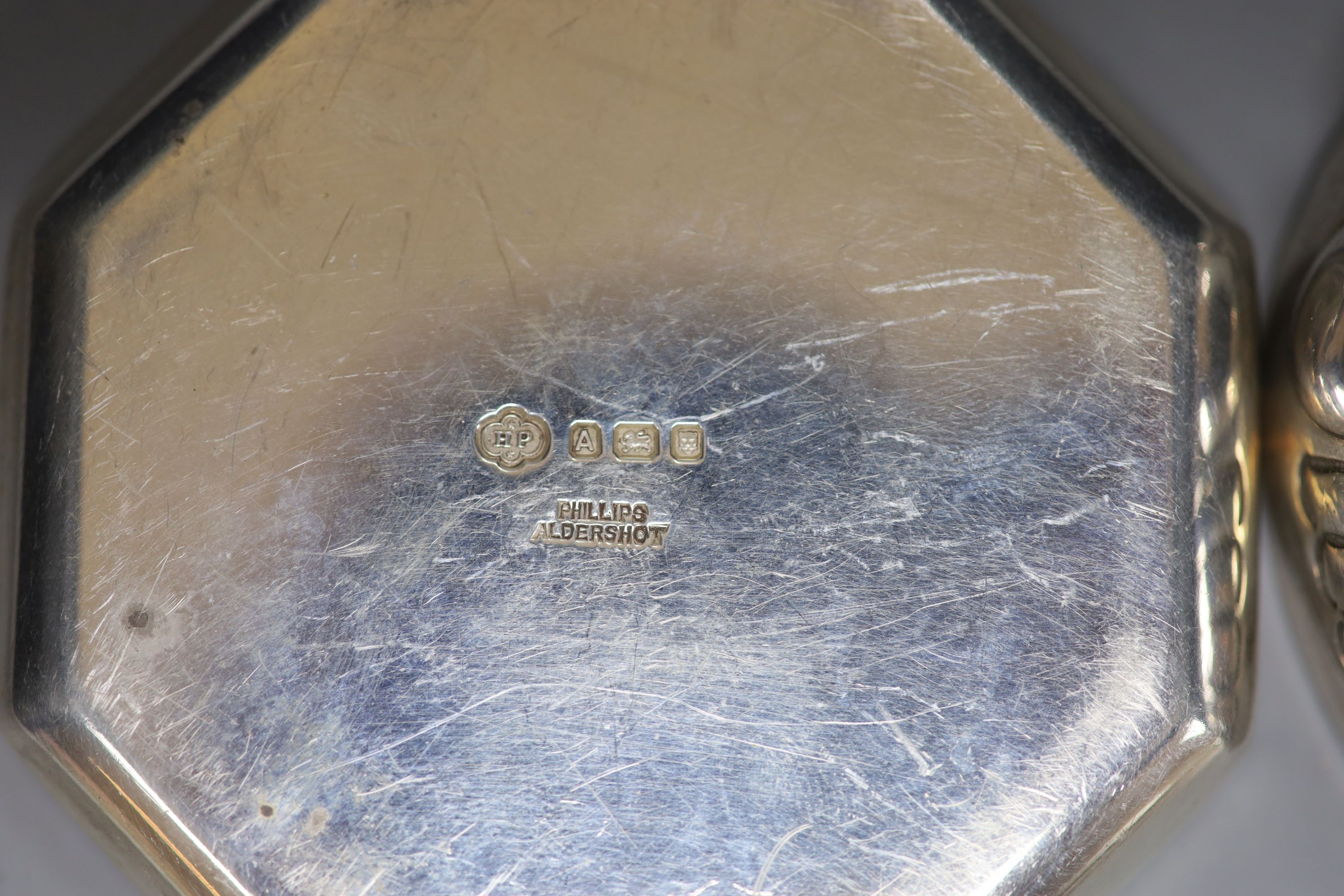 A pair of 1930's silver octagonal nut dishes, 83mm and a French white metal taste vin